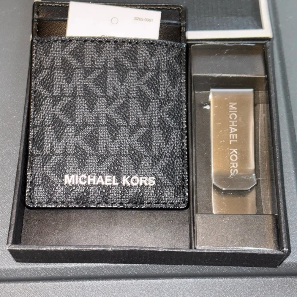 Michael Kors Black Wallet with Silver Brand Lettering with Belt Clip